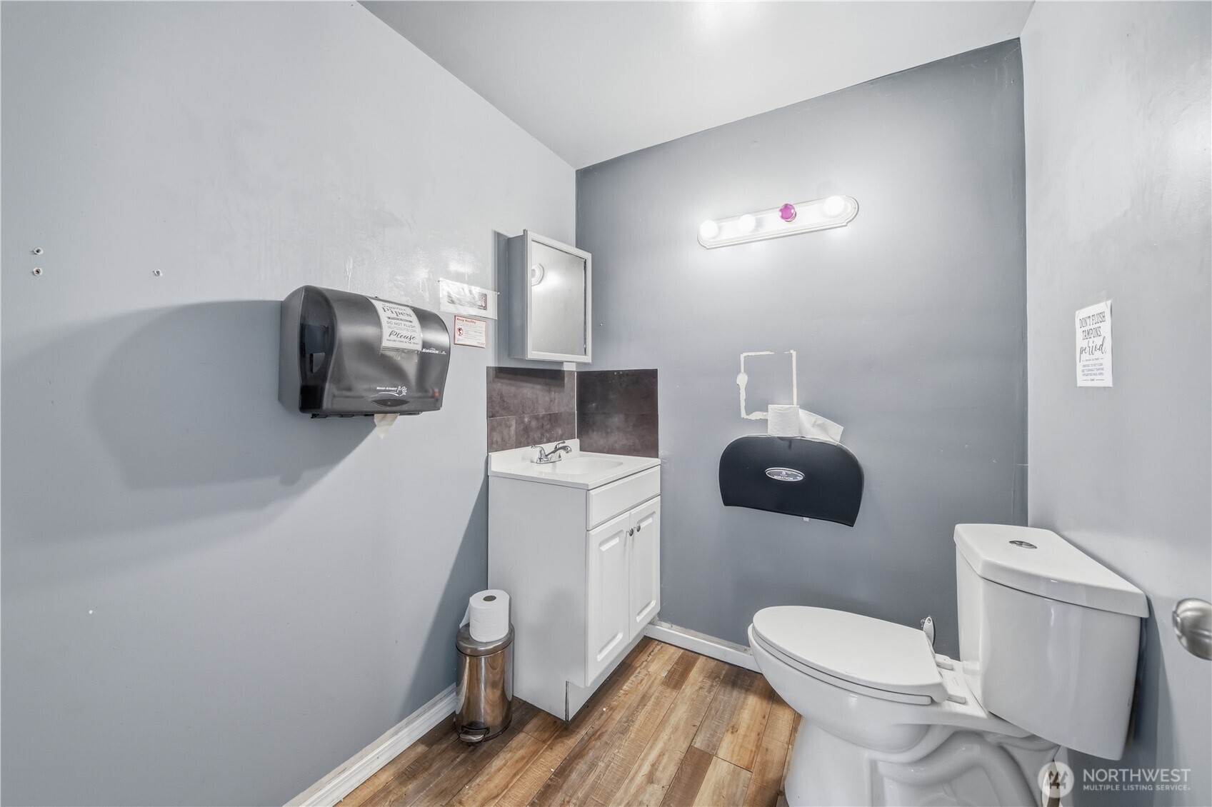 810 South Lake Roesiger Road Snohomish, WA 98290 - Photo 6 of 21 a bathroom with a toilet sink and mirror