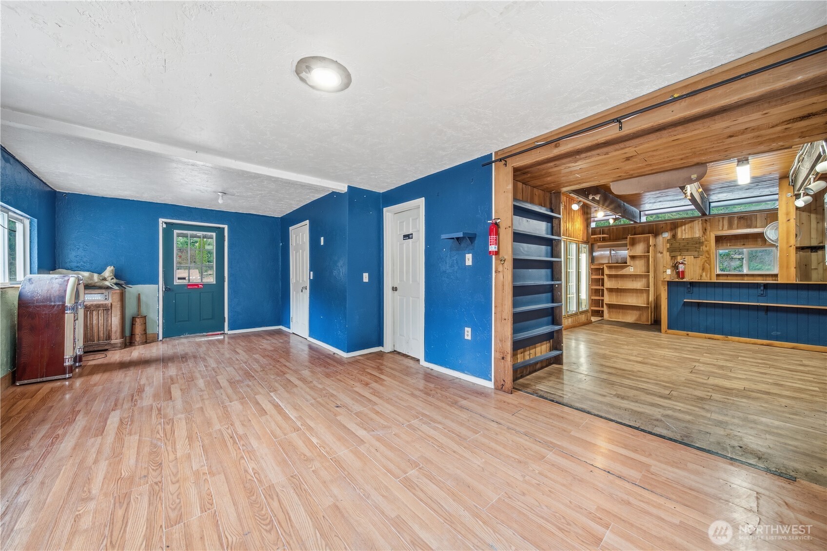 810 South Lake Roesiger Road Snohomish, WA 98290 - Photo 8 of 21 a view of a livingroom with furniture and an empty room