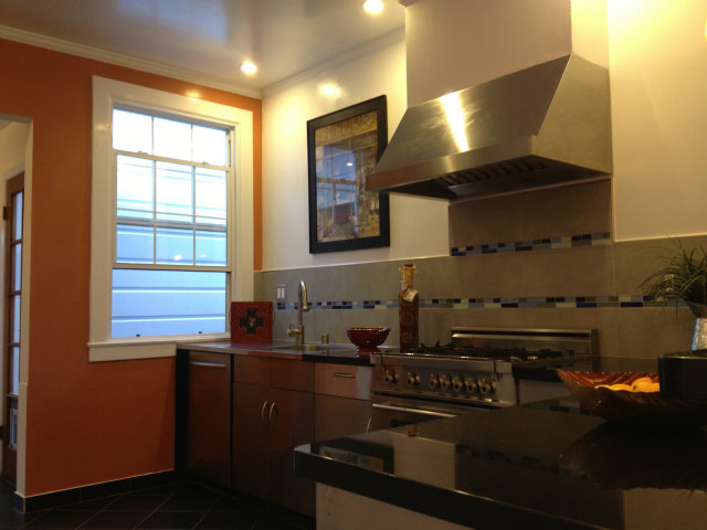 374 Rolph Street San Francisco, CA 94112 - Photo 11 of 20 a kitchen with a stove and a window