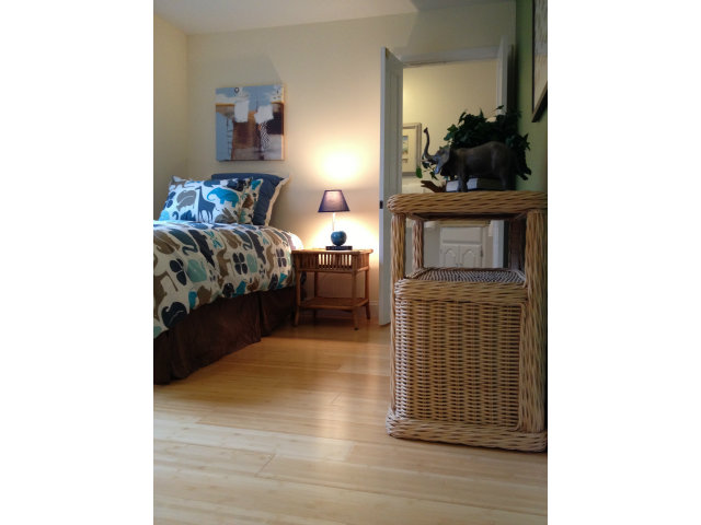 374 Rolph Street San Francisco, CA 94112 - Photo 14 of 20 a bedroom with furniture and a potted plant