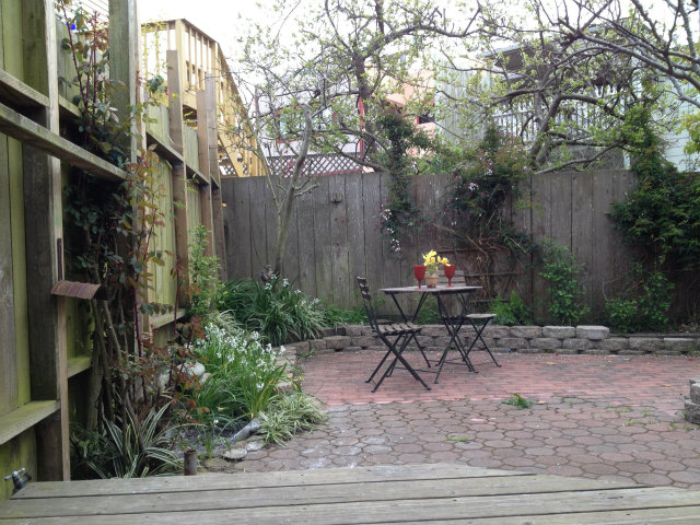374 Rolph Street San Francisco, CA 94112 - Photo 17 of 20 a garden view with a seating space