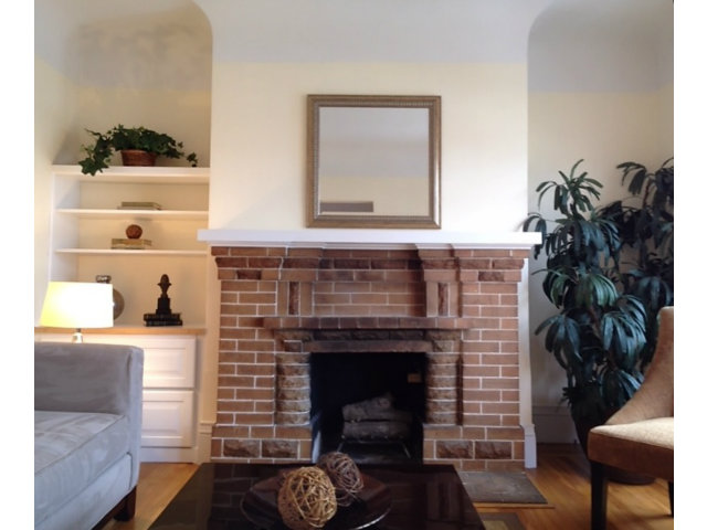 374 Rolph Street San Francisco, CA 94112 - Photo 3 of 20 a living room with furniture and a fireplace