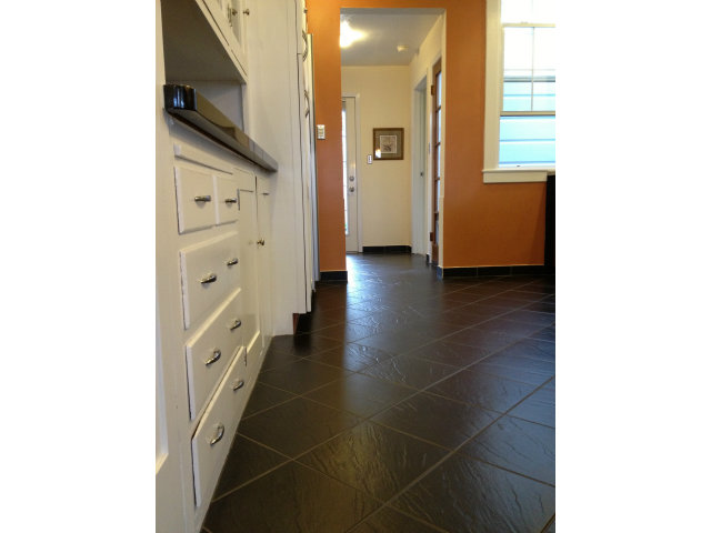 374 Rolph Street San Francisco, CA 94112 - Photo 8 of 20 a view of a hallway with wooden floor