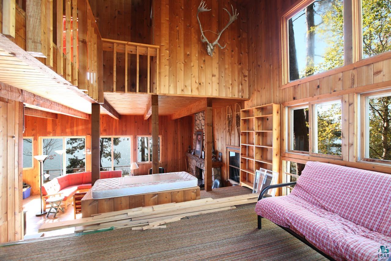 3-4 Wakemup Narrows North Cook, MN 55723 - Photo 7 of 41 Bedroom featuring wood walls and a high ceiling