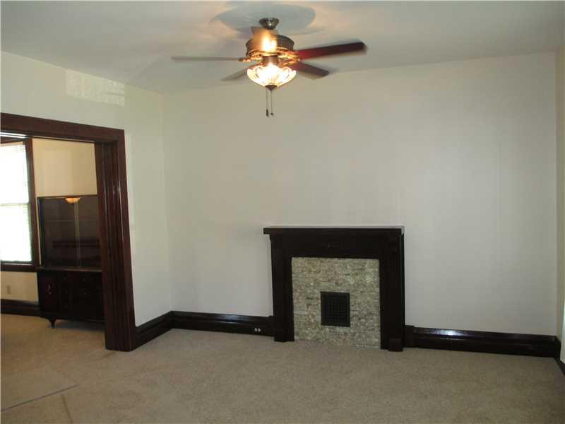 916 1st Street Verona, PA 15147 - Photo 3 of 22 Living Room. Living room with decorative fireplace