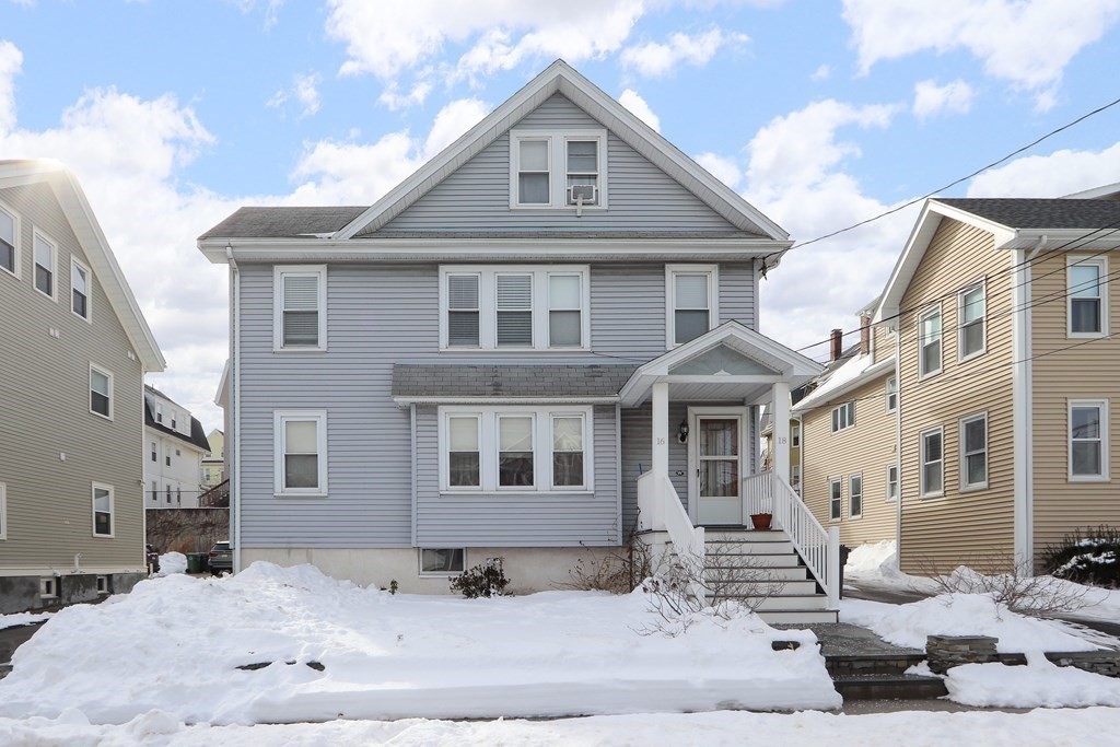 16-18 Kimball Road Watertown, MA 02472 - Photo 1 of 37 a front view of a house with a yard