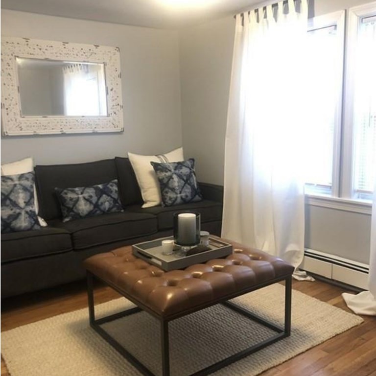 16-18 Kimball Road Watertown, MA 02472 - Photo 31 of 37 a living room with a couch