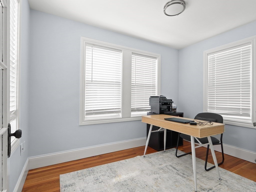 16-18 Kimball Road Watertown, MA 02472 - Photo 9 of 37 a view of a workspace with furniture and a window