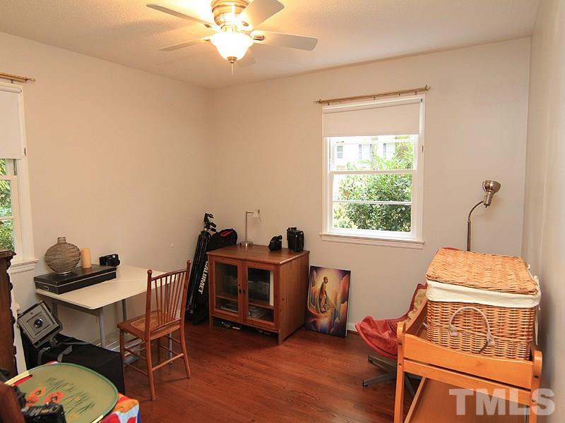 1009 Paddock Drive Raleigh, NC 27609 - Photo 15 of 18 a view of a workspace with furniture and a window