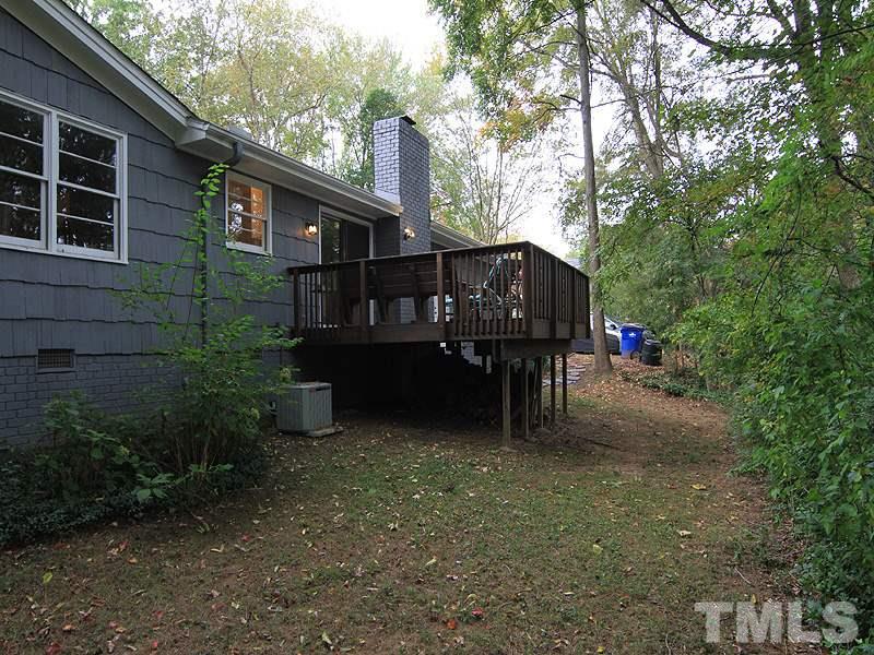 1009 Paddock Drive Raleigh, NC 27609 - Photo 18 of 18 a view of a house with a yard