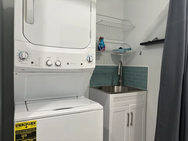 a bedroom with a bed and hallway