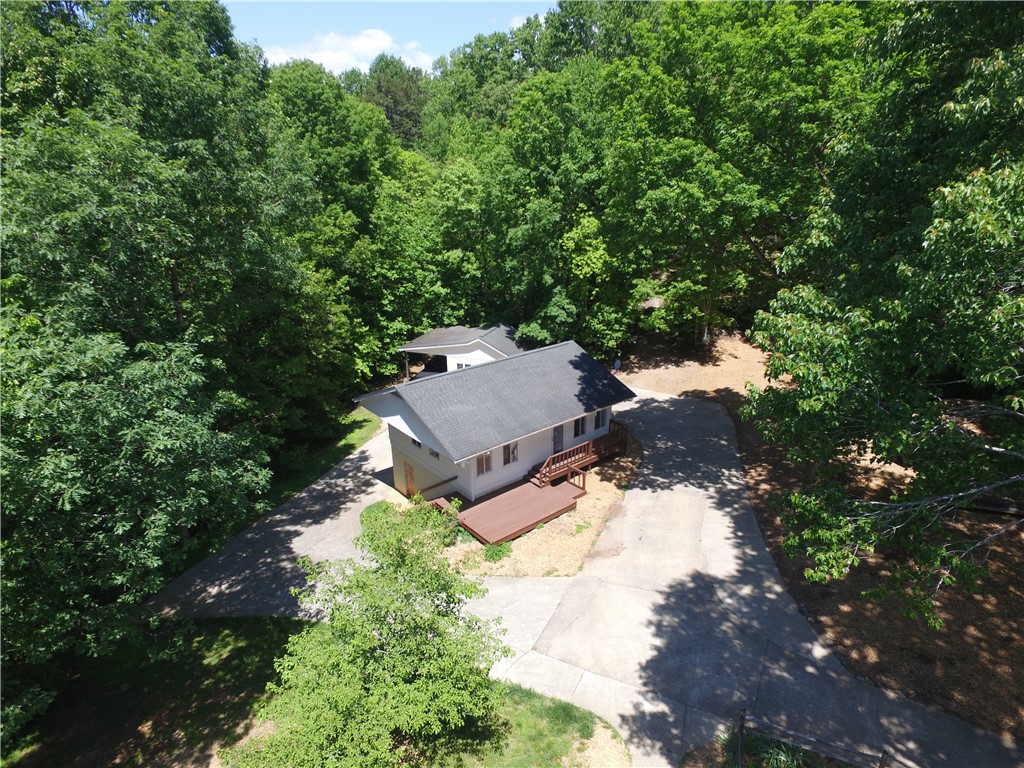 485 Mountain Rest Lake Road Mountain Rest, SC 29664 - Photo 5 of 45 The guest home has a circular drive that accesses a lower level 740 SF garage