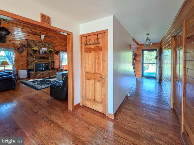 a view of a living room and hardwood floor