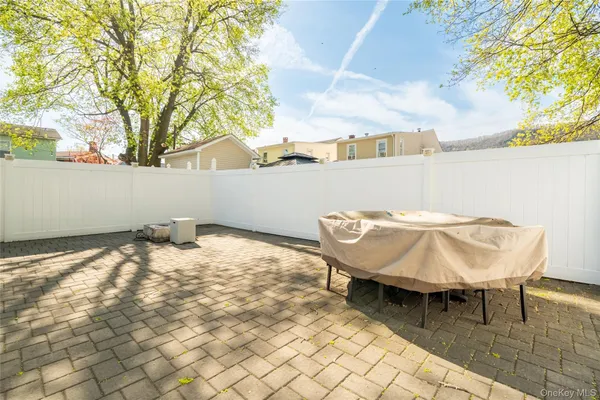 a view of a house with a patio