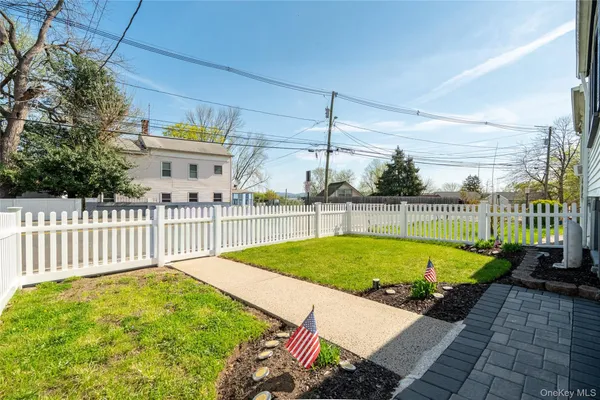 a view of a backyard with a house