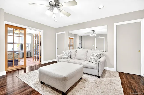 a living room with furniture and a rug
