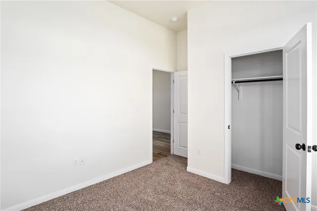 an aerial view of house with yard