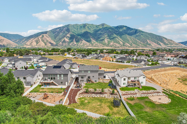 203 North 1900th Street West Mapleton, UT 84664 - Photo 44 of 48 Expansive mountain backdrop framing a residential neighborhood