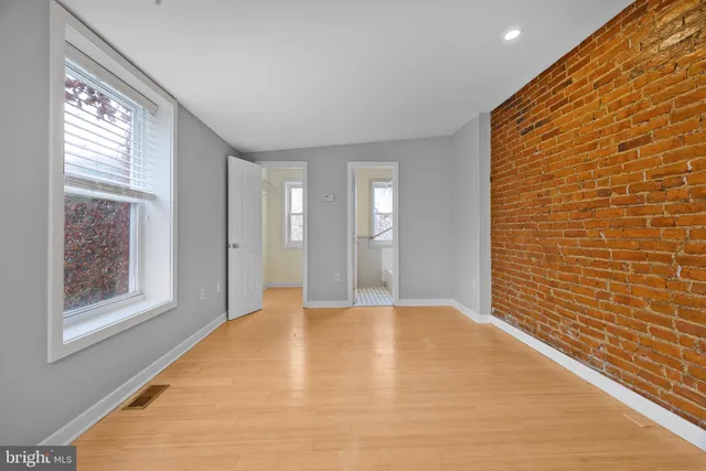 a view of an empty room and window