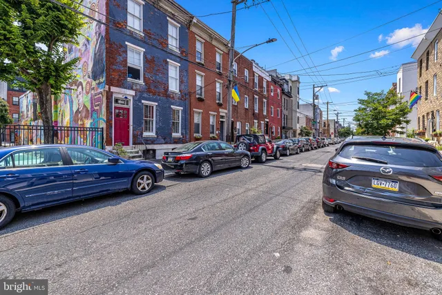 a car parked in front of a building
