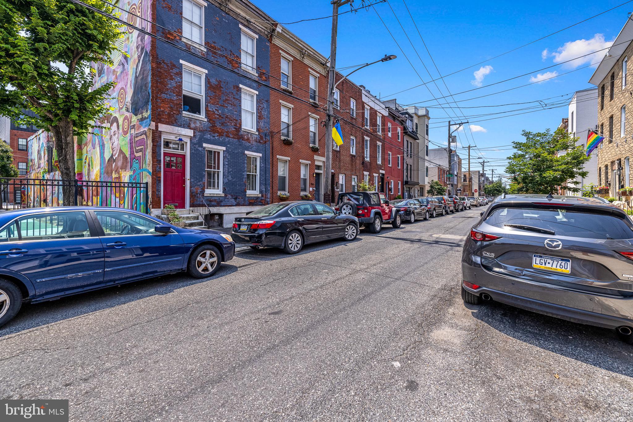 1516 Catharine Street, Unit 2 Philadelphia, PA 19146 - Photo 30 of 31 a car parked in front of a building