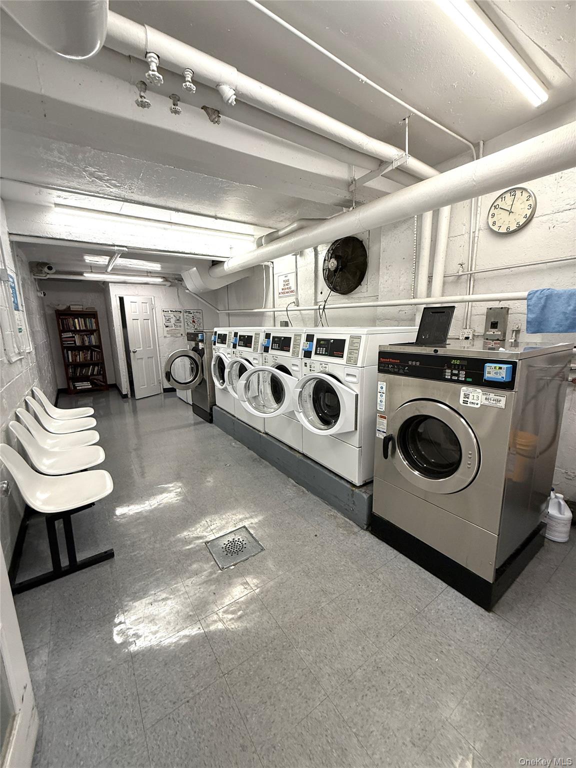 33-25 90th Street, Unit 5D Queens, NY 11372 - Photo 11 of 18 a utility room with dryer and washer