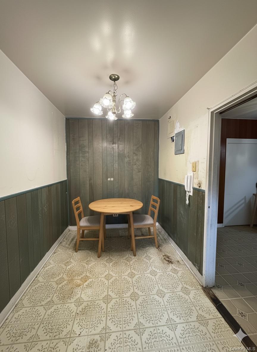 33-25 90th Street, Unit 5D Queens, NY 11372 - Photo 4 of 18 a view of a room with a table and chairs