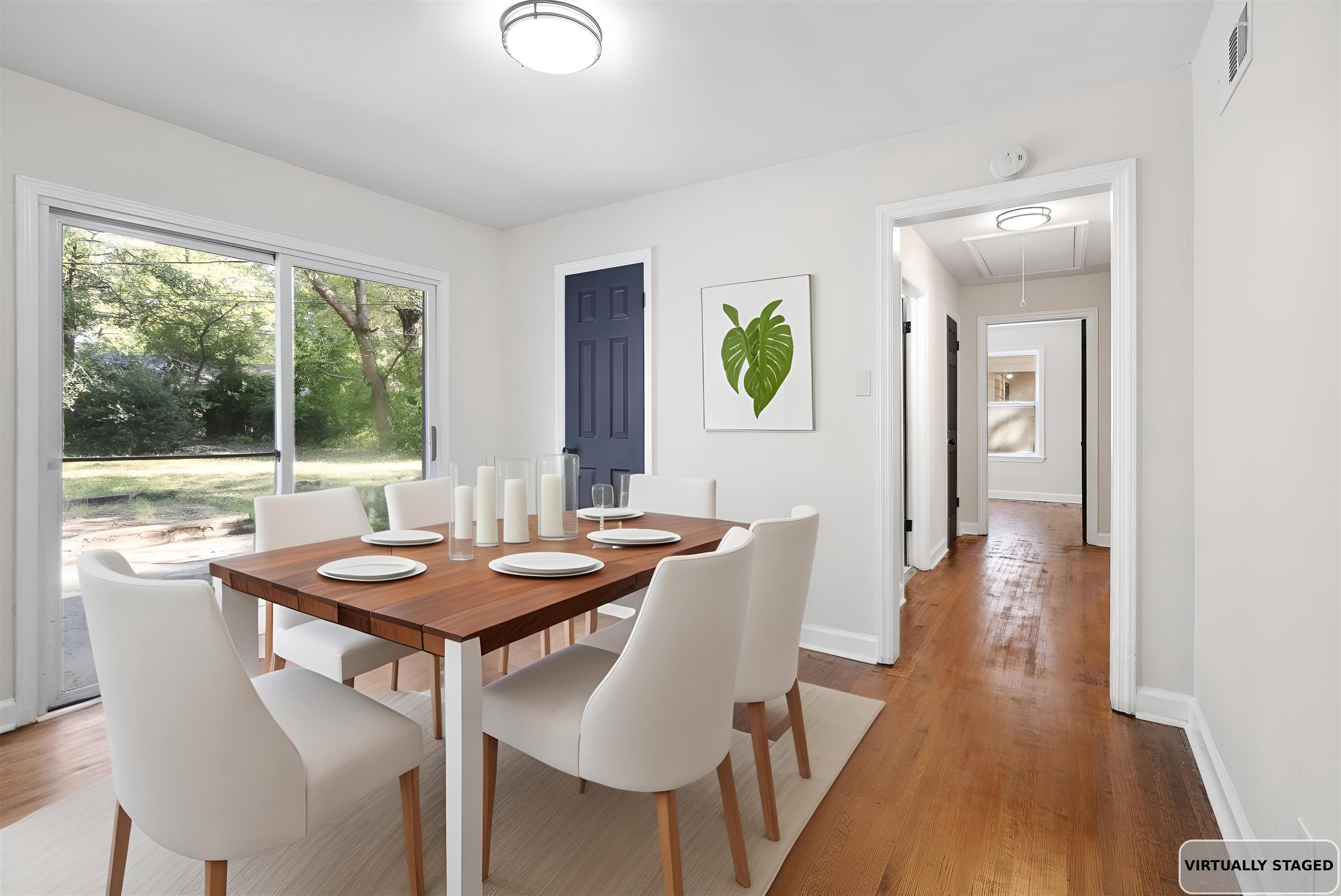 1168 South Perkins Road Memphis, TN 38117 - Photo 13 of 34 a view of a dining room with furniture and wooden floor