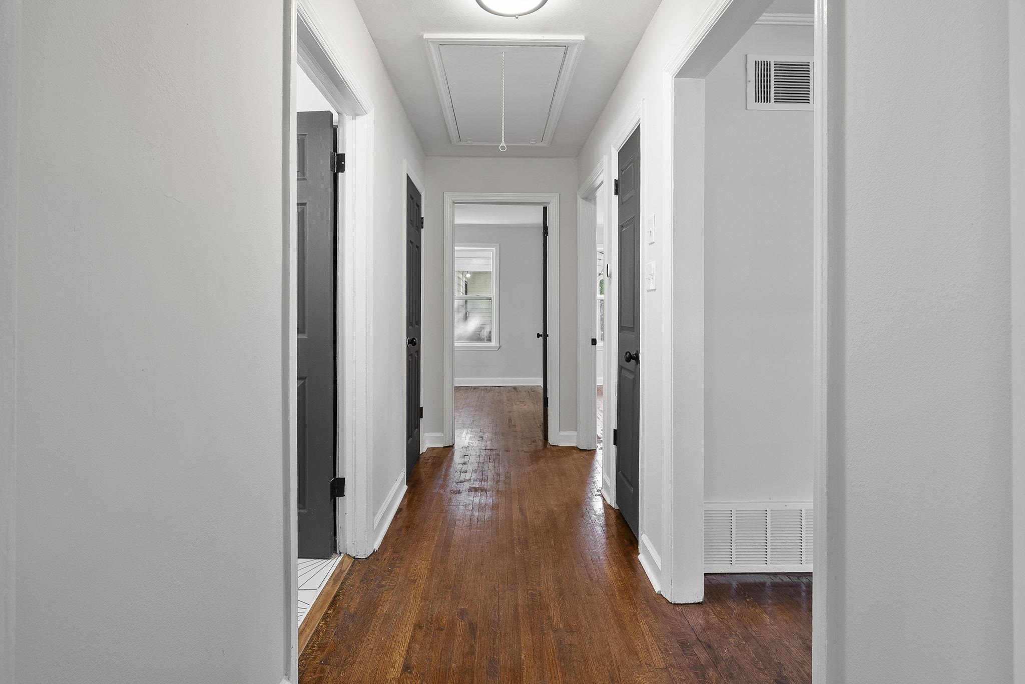 1168 South Perkins Road Memphis, TN 38117 - Photo 20 of 34 a view of a hallway with wooden floor