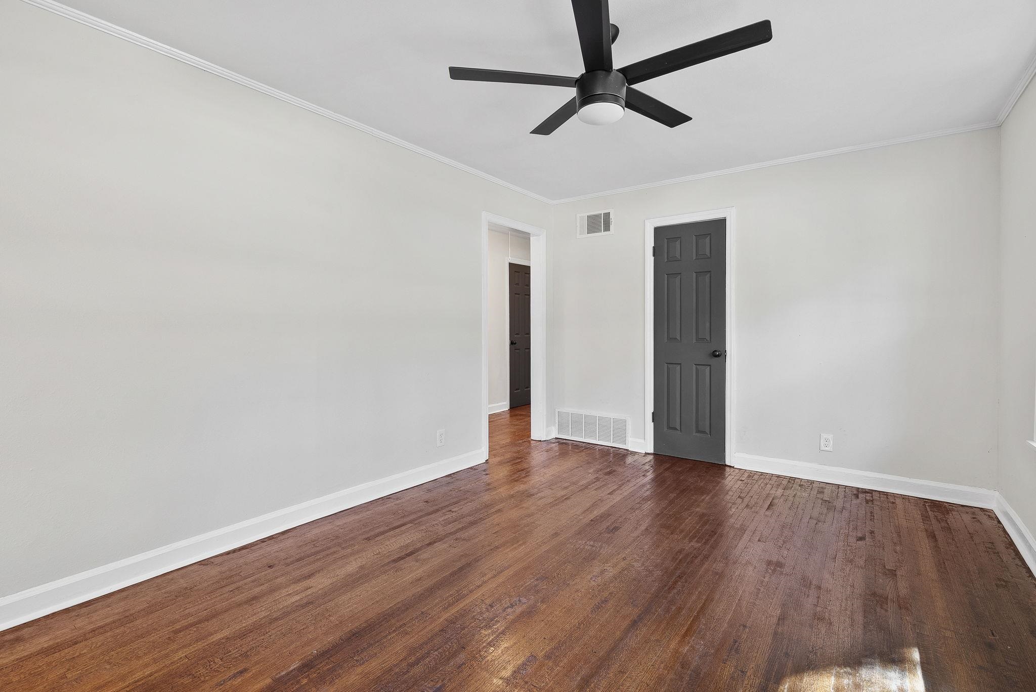 1168 South Perkins Road Memphis, TN 38117 - Photo 6 of 34 wooden floor in an empty room