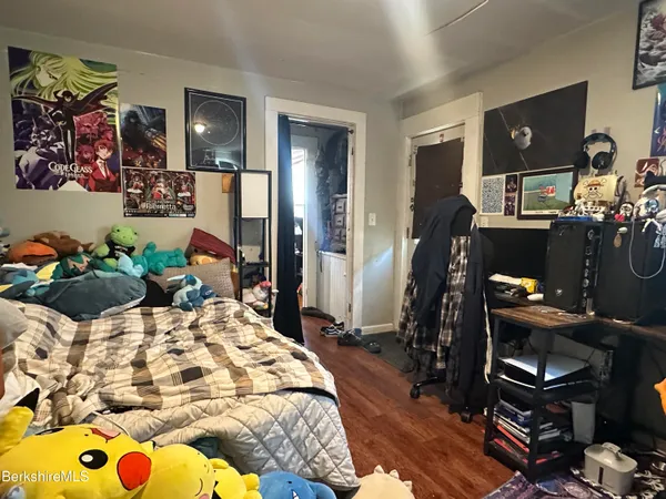 a bathroom with a tub sink and a window