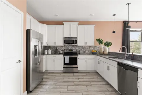 $673,500 | 1518 Rolling Fairway Drive, Davenport, FL 33896