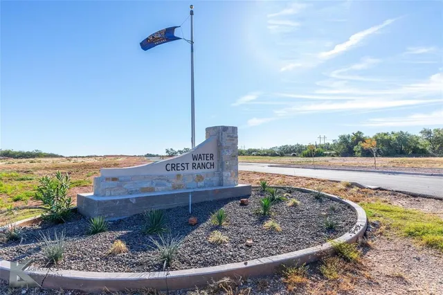 a view of a garden and lake