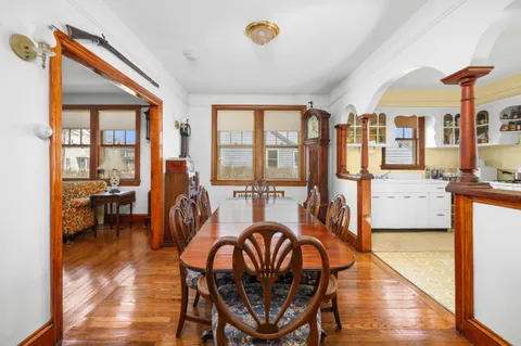 a kitchen that has a sink and a stove