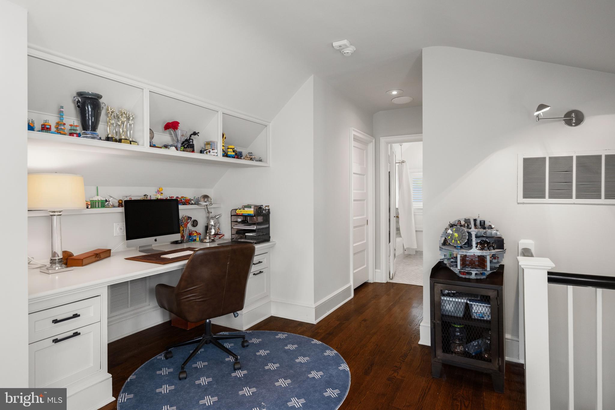 2931 Foxhall Road Northwest Washington, DC 20016 - Photo 41 of 62 a workspace with furniture and wooden floor