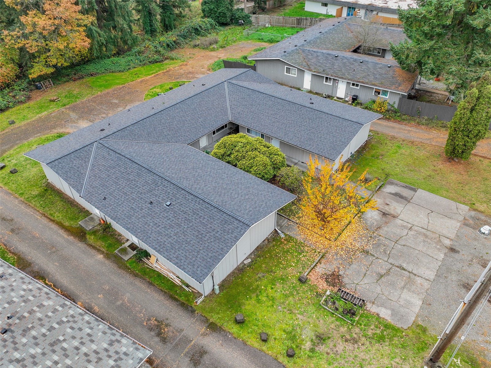 1126 Neil Street Northeast Olympia, WA 98516 - Photo 3 of 21 an aerial view of a house with a swimming pool