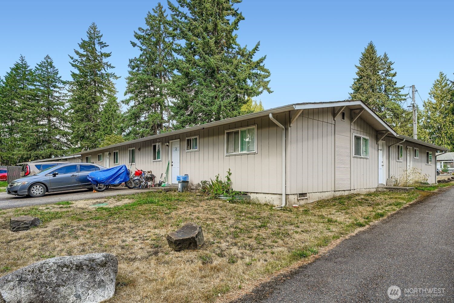 1126 Neil Street Northeast Olympia, WA 98516 - Photo 6 of 21 a view of a house with a yard