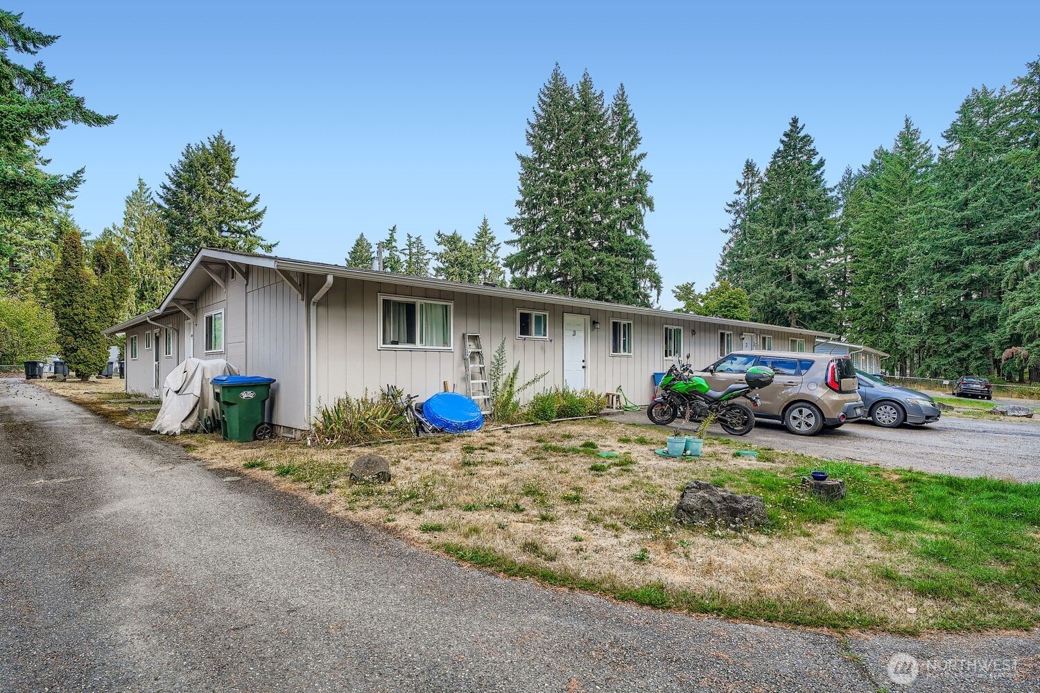 1126 Neil Street Northeast Olympia, WA 98516 - Photo 7 of 21 a view of a house with backyard