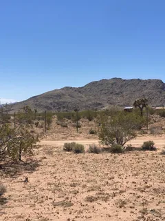 a picture of a bathroom with a shower