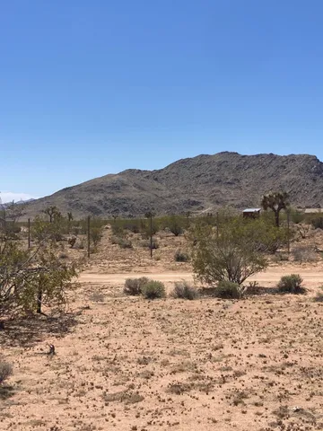 a picture of a bathroom with a shower