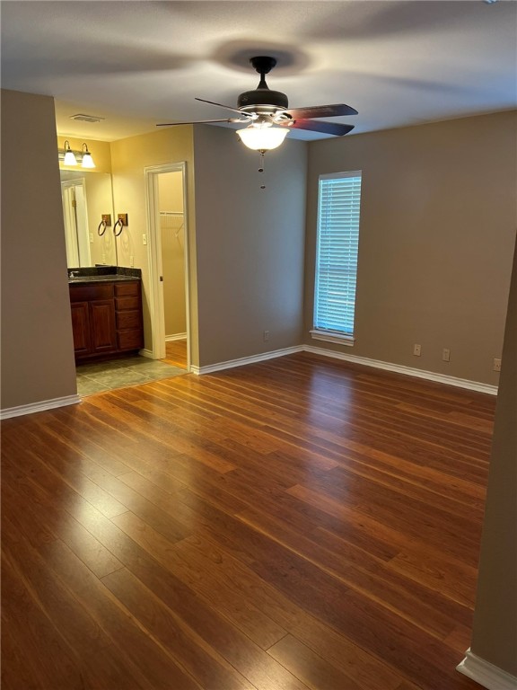6917 Holiday Corpus Christi, TX 78414 - Photo 6 of 13 a view of an empty room with window and wooden floor