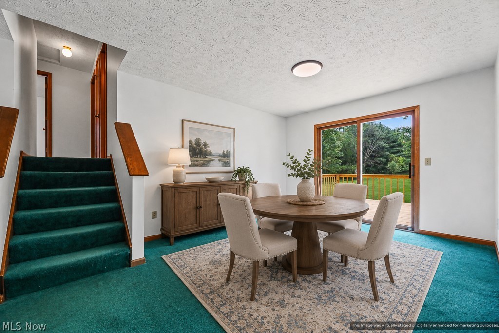 2642 Blake Road Wadsworth, OH 44281 - Photo 11 of 46 Bright interior space with white walls and green carpet