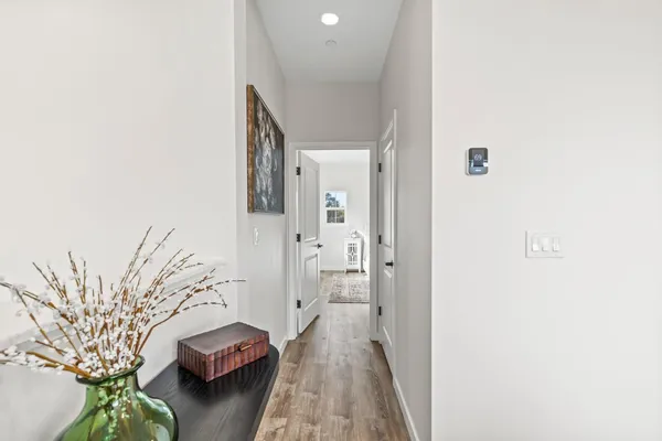 a view of livingroom with furniture and hardwood floor