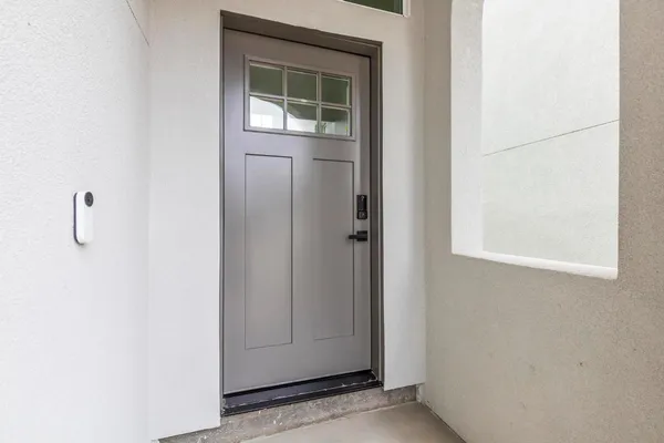 a front view of a house with garage
