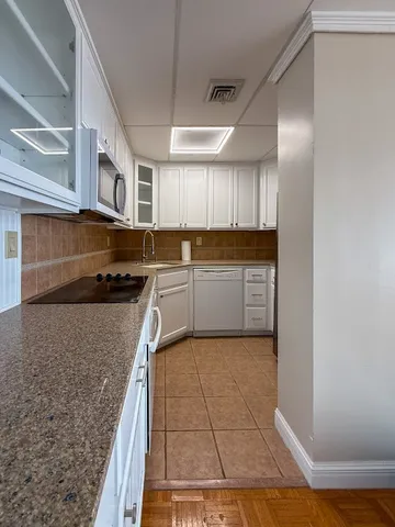 a view of a kitchen with a stove