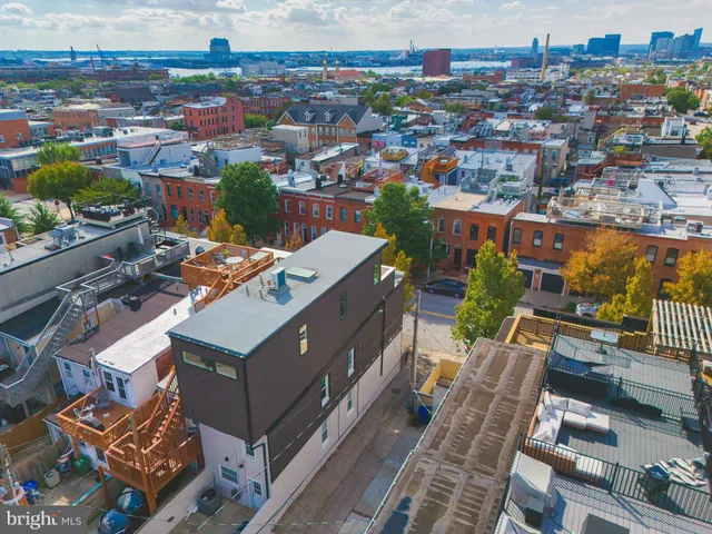 an aerial view of a city with lots of residential buildings