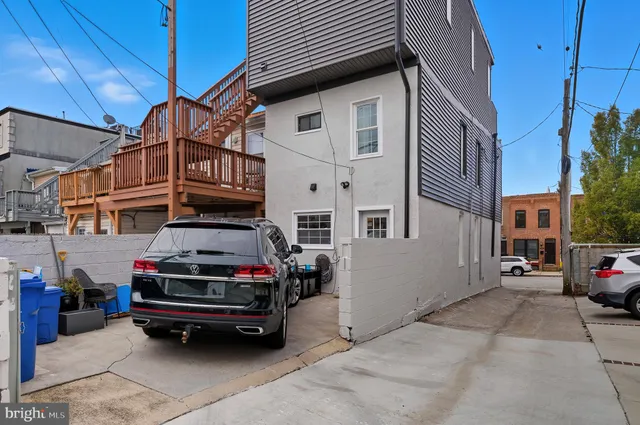 a car parked in front of a building