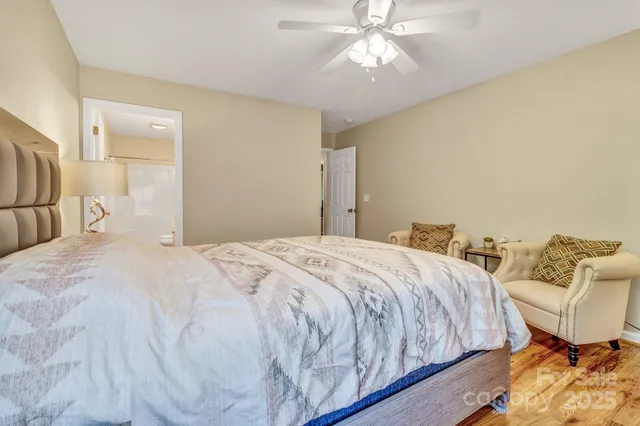 a bedroom with bed and window