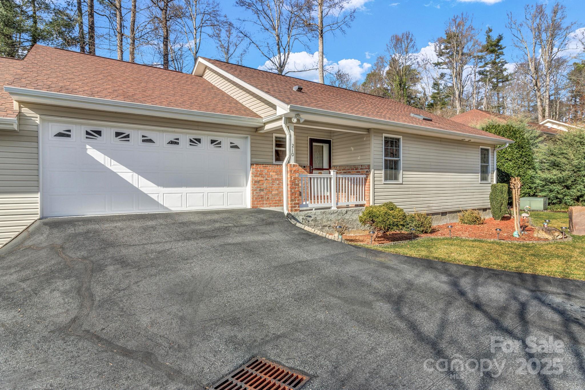 210 Allen Paul Road Hendersonville, NC 28791 - Photo 4 of 48 a view of a house with a outdoor space