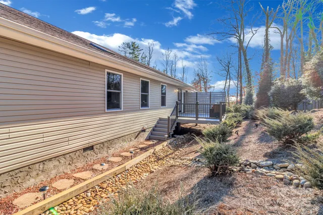 a backyard of a house with lots of green space